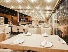 restaurant-hall-with-lots-table_140725-6309